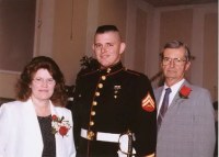 Derek with his parents